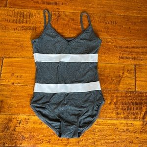 Grey with two white bands leotard. AXS